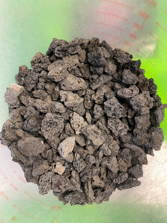 Black lava stone top dressing.